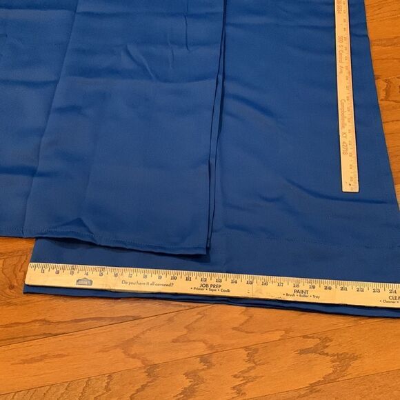 One pair of curtains 44” length 50” wide (for a total of 100” in width). NWT - Picture 2 of 3